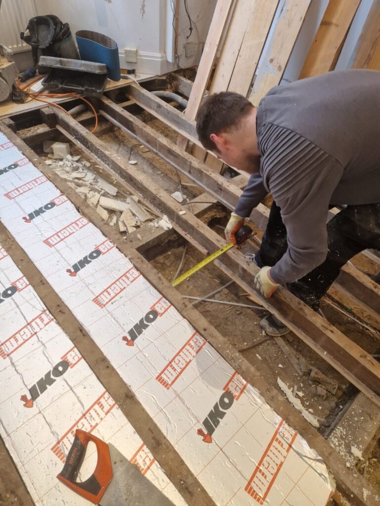 Insulation-board-is-cut-down-to-size